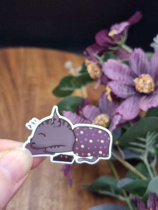 Fell asleep reading sleepy cat - bookish cat sticker